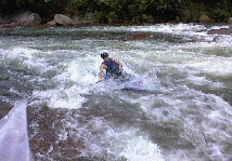 Chris Burt surfing his C1 on the Ocoee